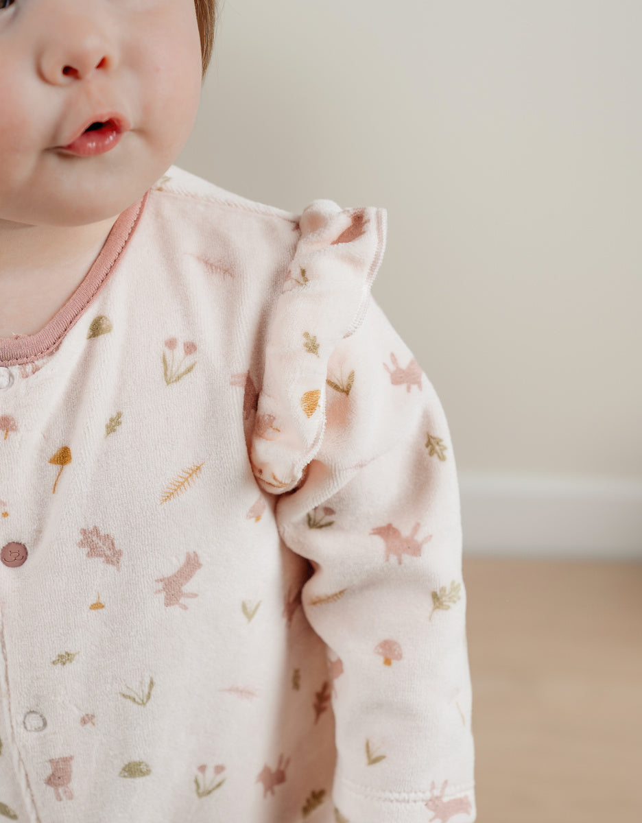 Noukie’s Pale Pink Velour Baby Pajamas with Ruffles – Floral Print